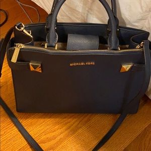 Large Micheal Kors navy blue purse with crossbody strap